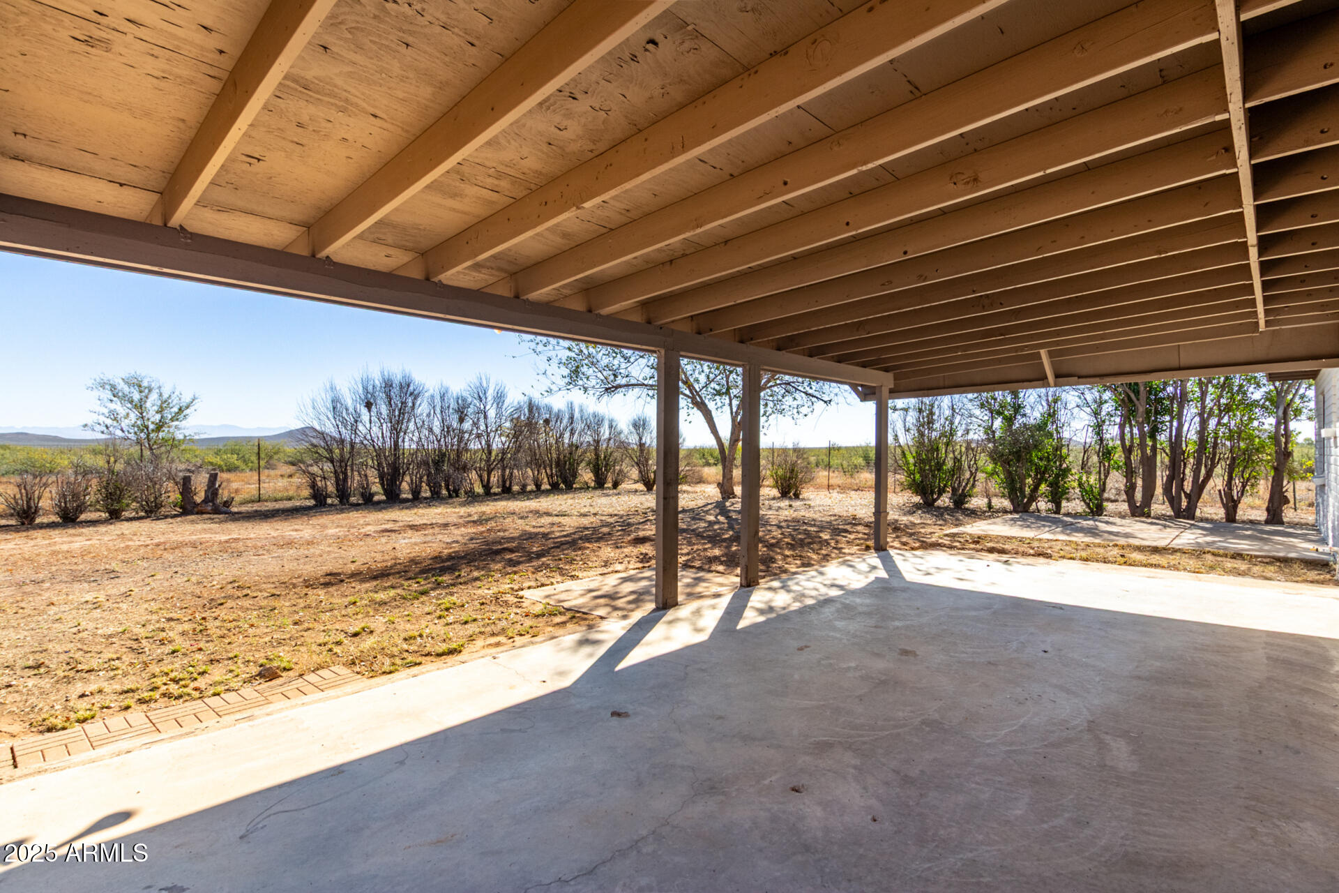 3613 East White Tail Road Pearce, AZ 85625 - Photo 28 of 39 a view of a backyard of the house