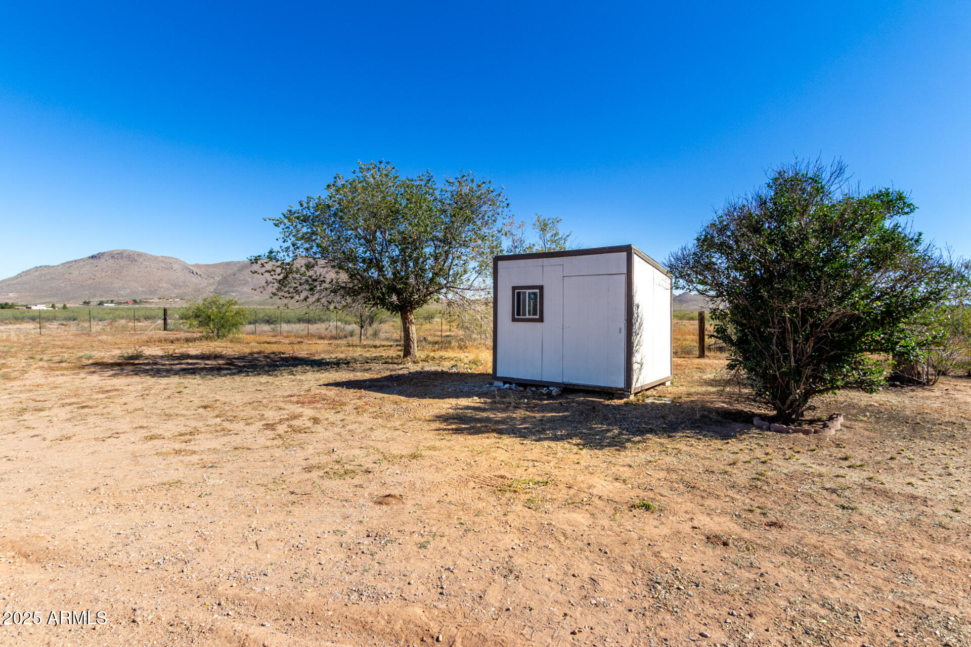 3613 East White Tail Road Pearce, AZ 85625 - Photo 31 of 39 a view of backyard with mountain view