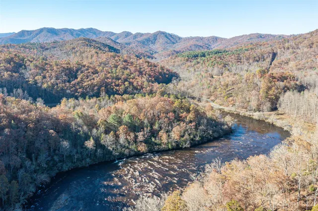 a view of a dry with mountains in the background