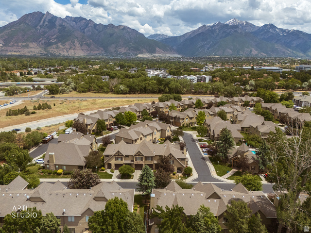 6761 950 East Midvale, UT 84047 - Photo 40 of 44 Extensive residential development nestled against a prominent mountain range