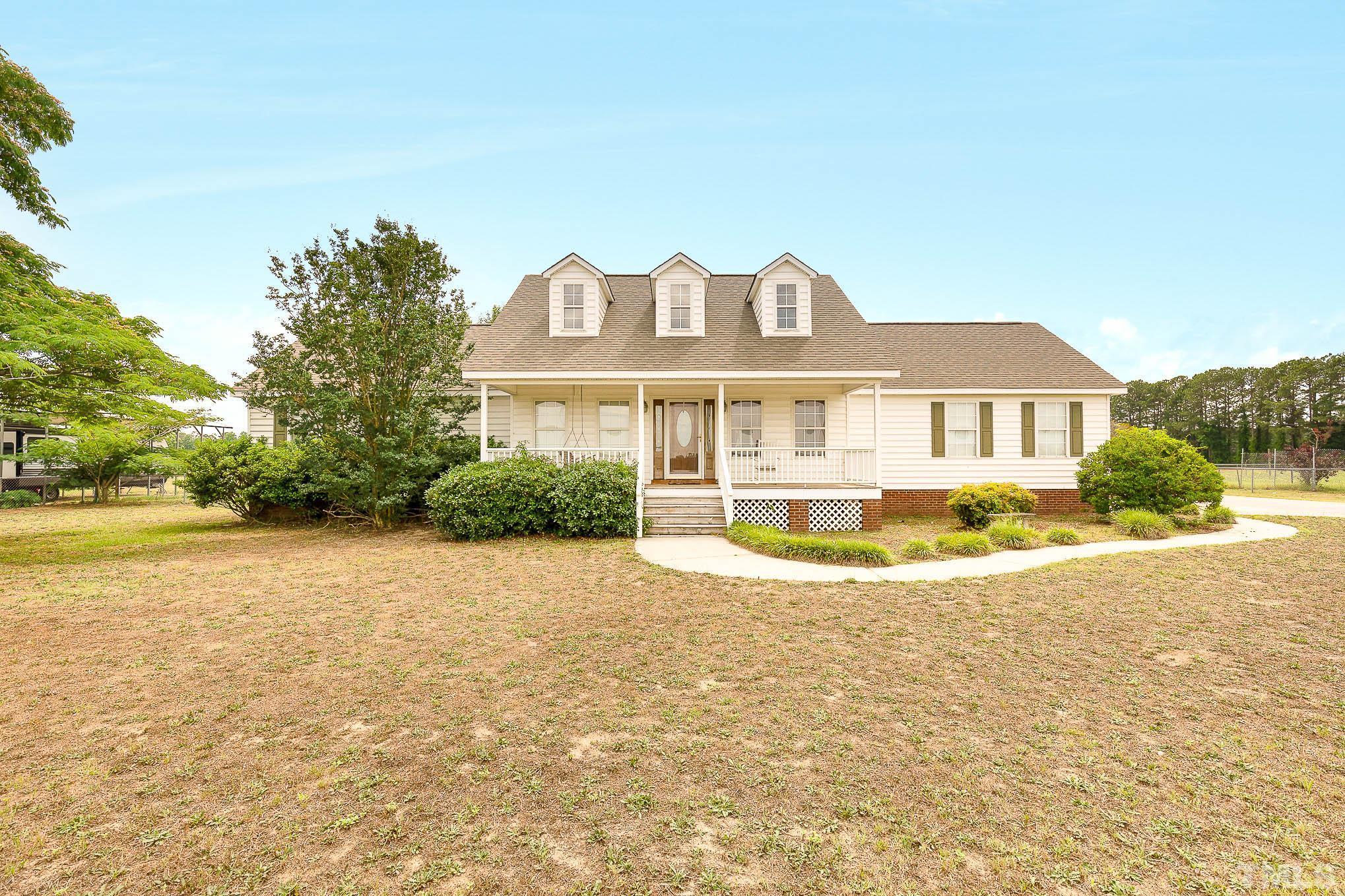 2809 Hayfield Road Wade, NC 28395 - Photo 1 of 22 a view of a house with a swimming pool