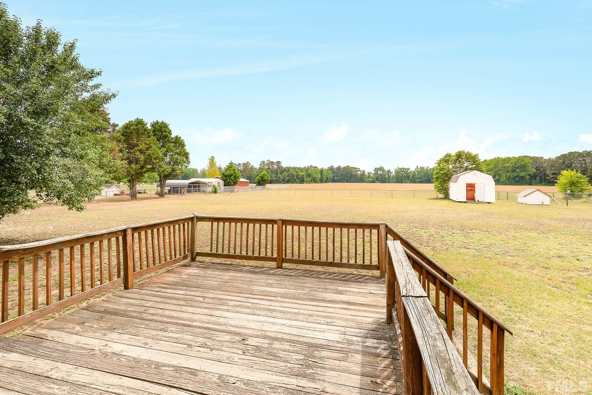 2809 Hayfield Road Wade, NC 28395 - Photo 17 of 22 a view of balcony with wooden floor and fence