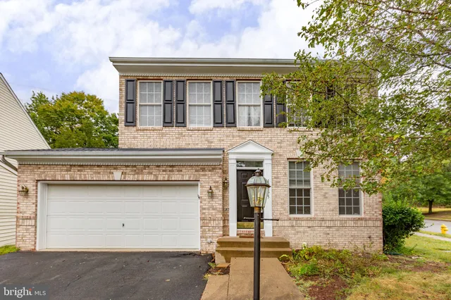 front view of a house with a street