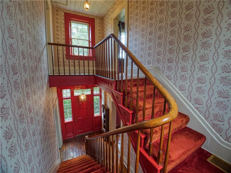 461 Lindsay Road Zelienople, PA 16063 - Photo 15 of 25 The original staircase to the second level is detailed and impressive.