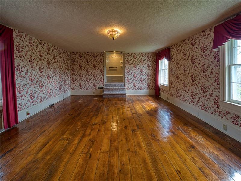 461 Lindsay Road Zelienople, PA 16063 - Photo 17 of 25 The master features private access to the updated full bathroom.
