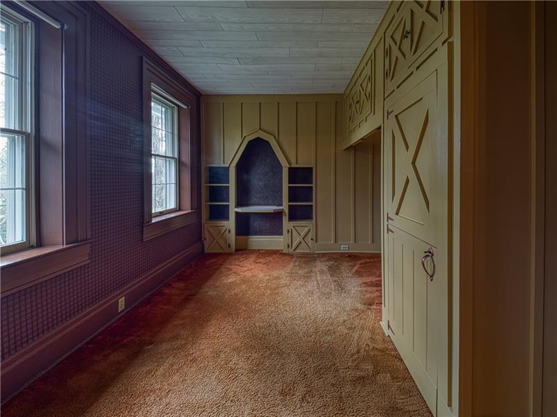 461 Lindsay Road Zelienople, PA 16063 - Photo 22 of 25 The custom details include a built in desk and storage.