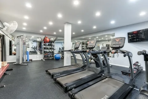 a view of a room with gym equipment