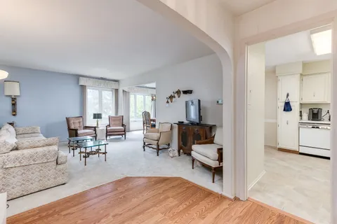 a living room with furniture and view of living room