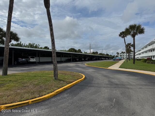 3190 North Atlantic Avenue, Unit 206 Cocoa Beach, FL 32931 - Photo 12 of 14 Covered parking