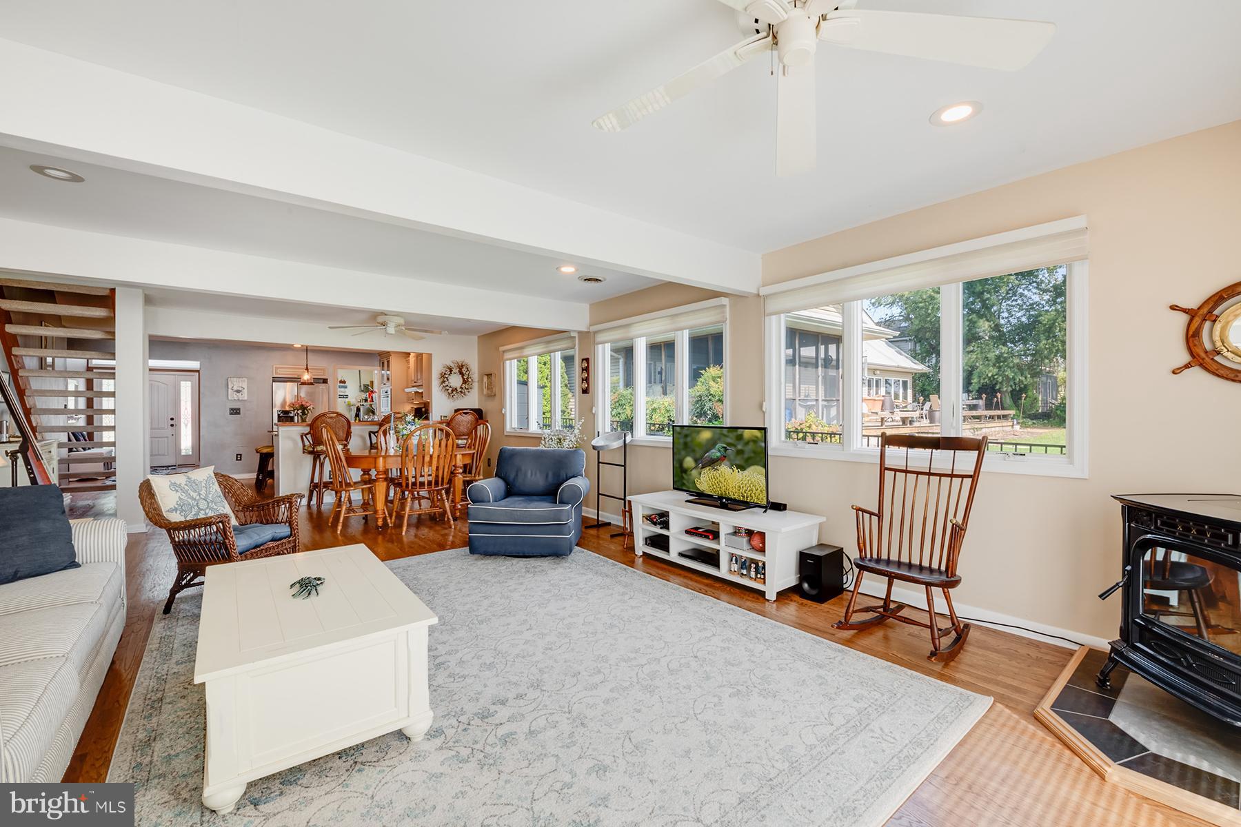 8111 Ventnor Road Pasadena, MD 21122 - Photo 12 of 30 Family Room has pellet stove + wood floors