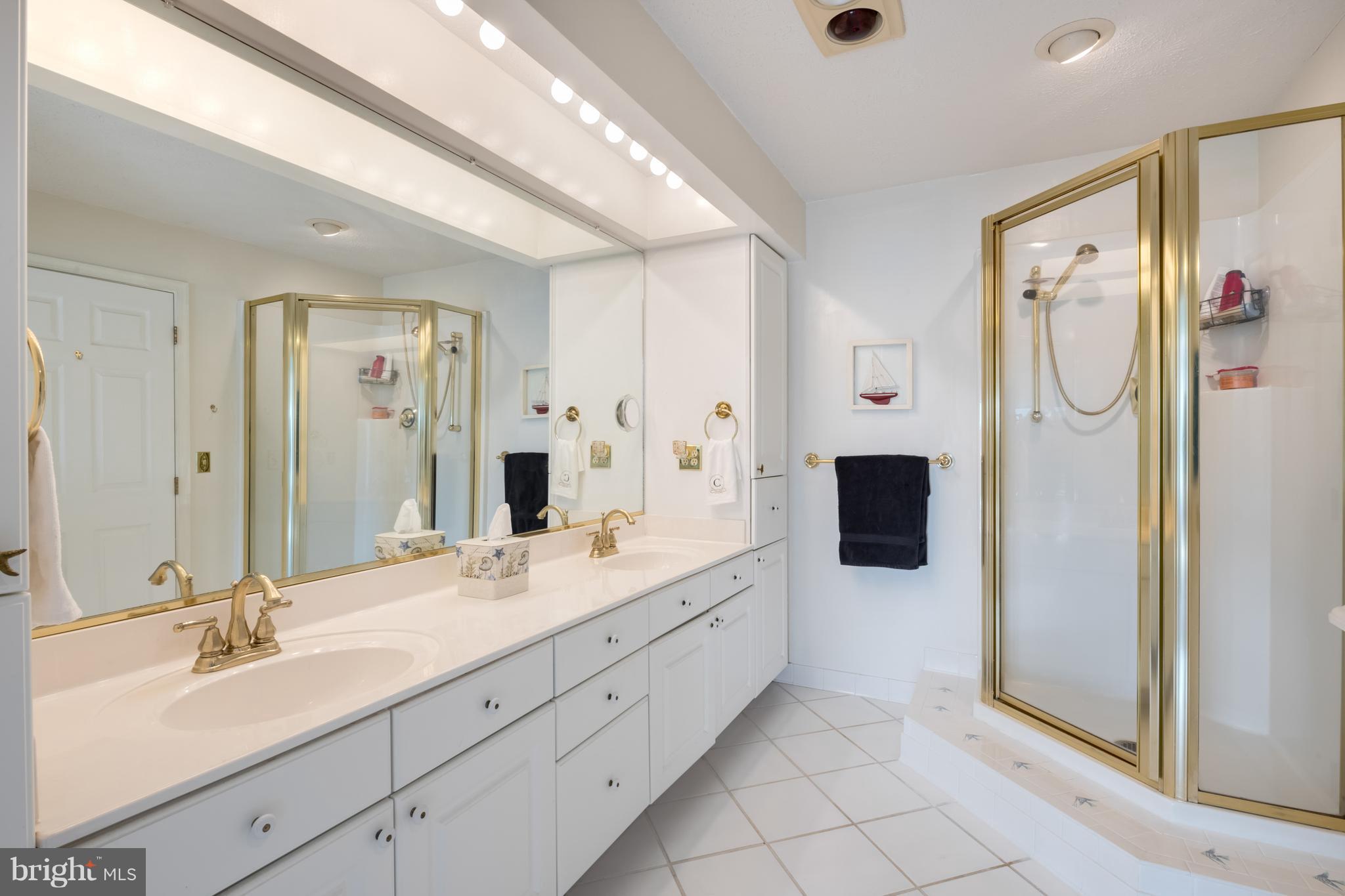 8111 Ventnor Road Pasadena, MD 21122 - Photo 16 of 30 Master bath has dual sink vanity + large shower