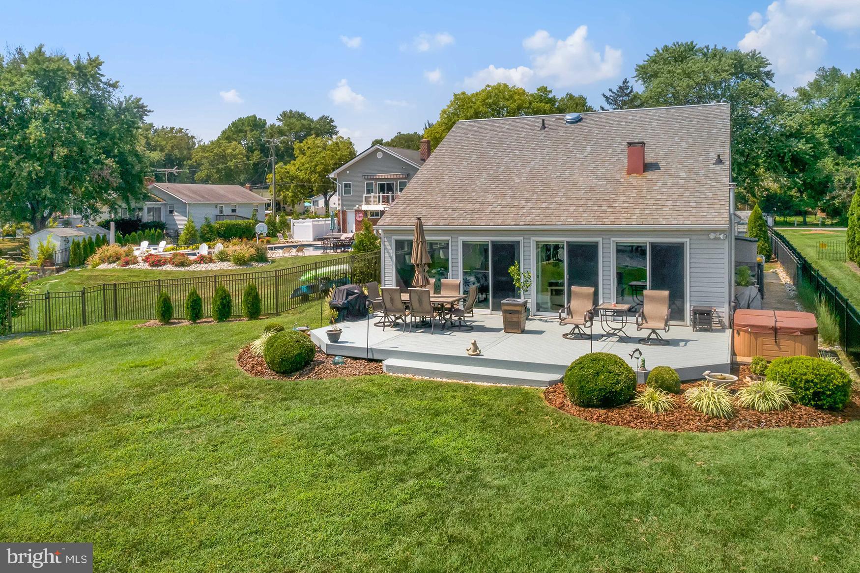 8111 Ventnor Road Pasadena, MD 21122 - Photo 24 of 30 A wall of sliding glass doors enhances the views