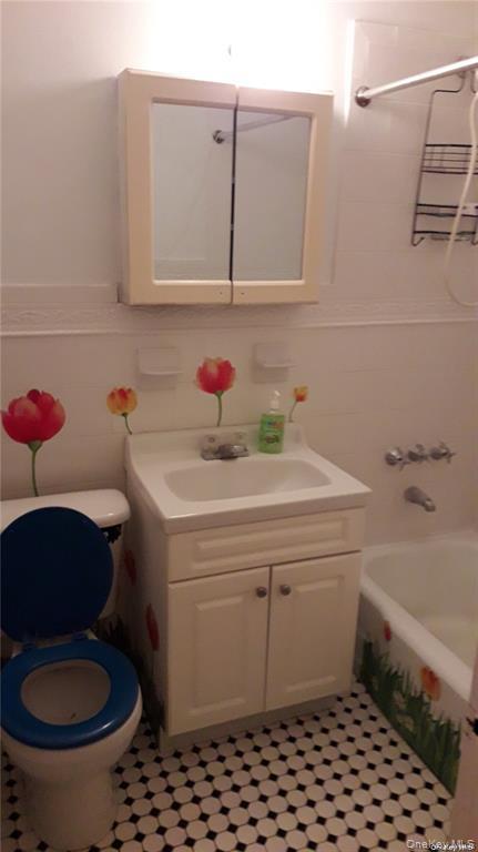 131-11 Kew Gardens Road, Unit 6N Queens, NY 11418 - Photo 4 of 14 a bathroom with a sink toilet and shower