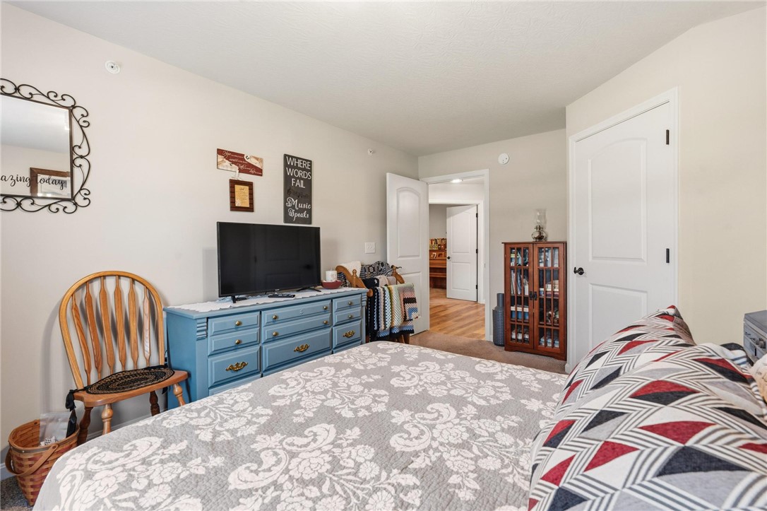 88 Old Pond Road Springboro, OH 45066 - Photo 22 of 29 This cozy room features soft lighting and neutral walls, perfect for creating a relaxing atmosphere.