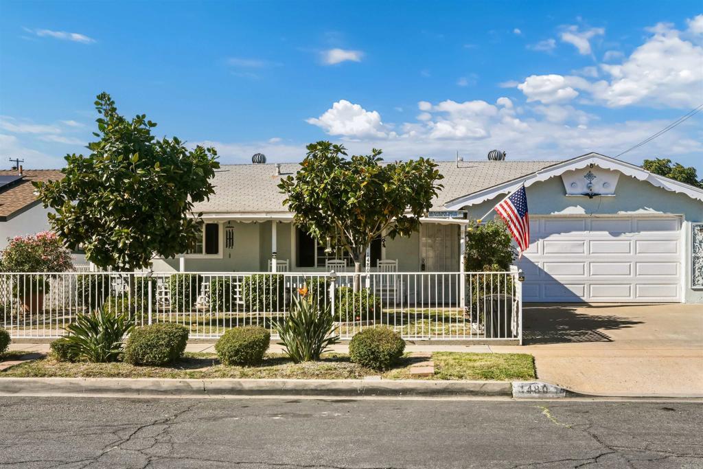 1480 Taylor Avenue Escondido, CA 92027 - Photo 2 of 23 a view of a house with a small yard and plants