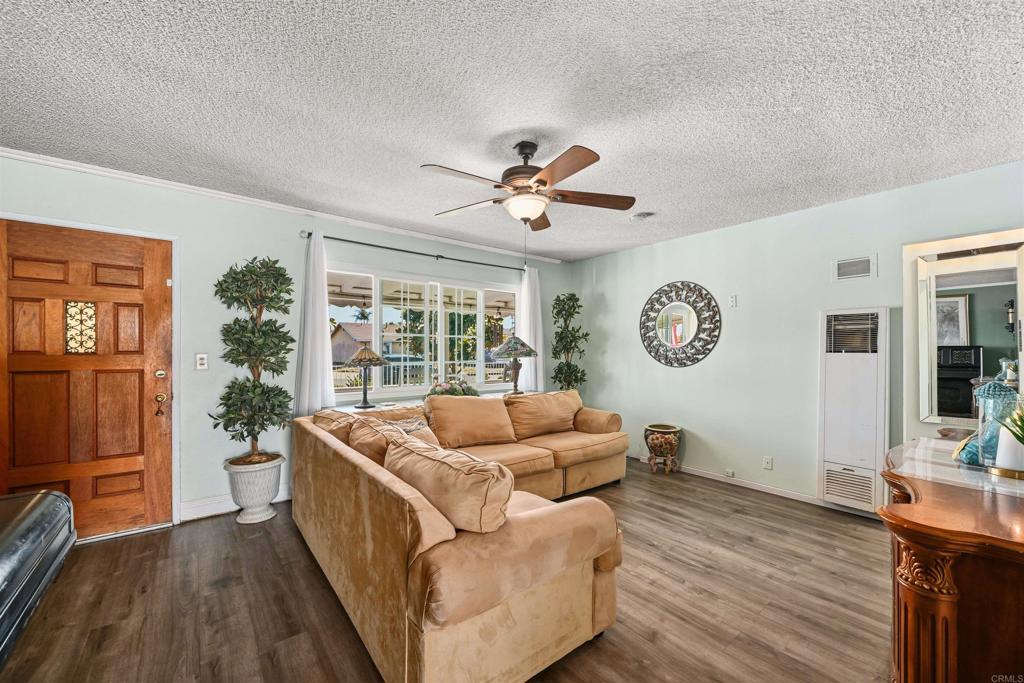 1480 Taylor Avenue Escondido, CA 92027 - Photo 4 of 23 a living room with furniture and a large window