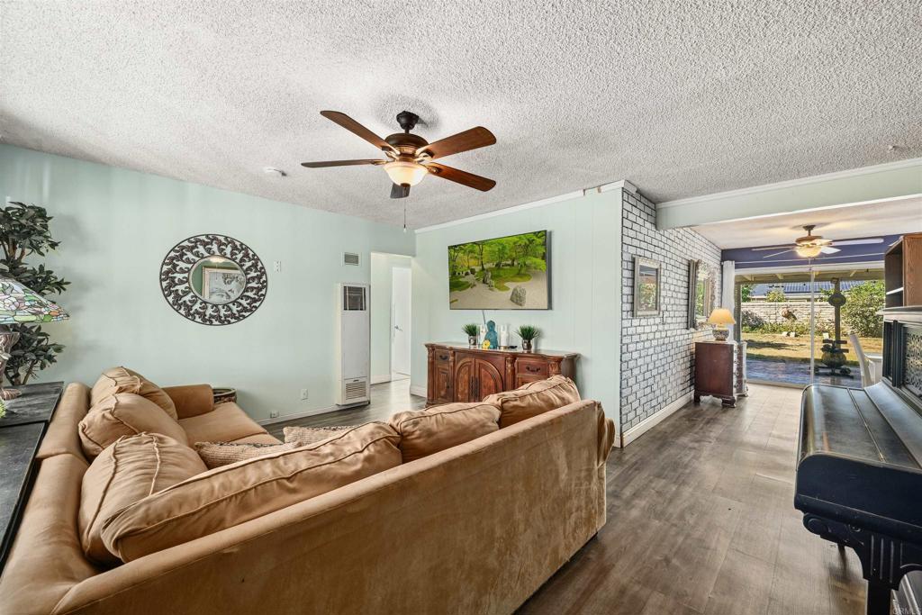 1480 Taylor Avenue Escondido, CA 92027 - Photo 7 of 23 a living room with furniture and a flat screen tv