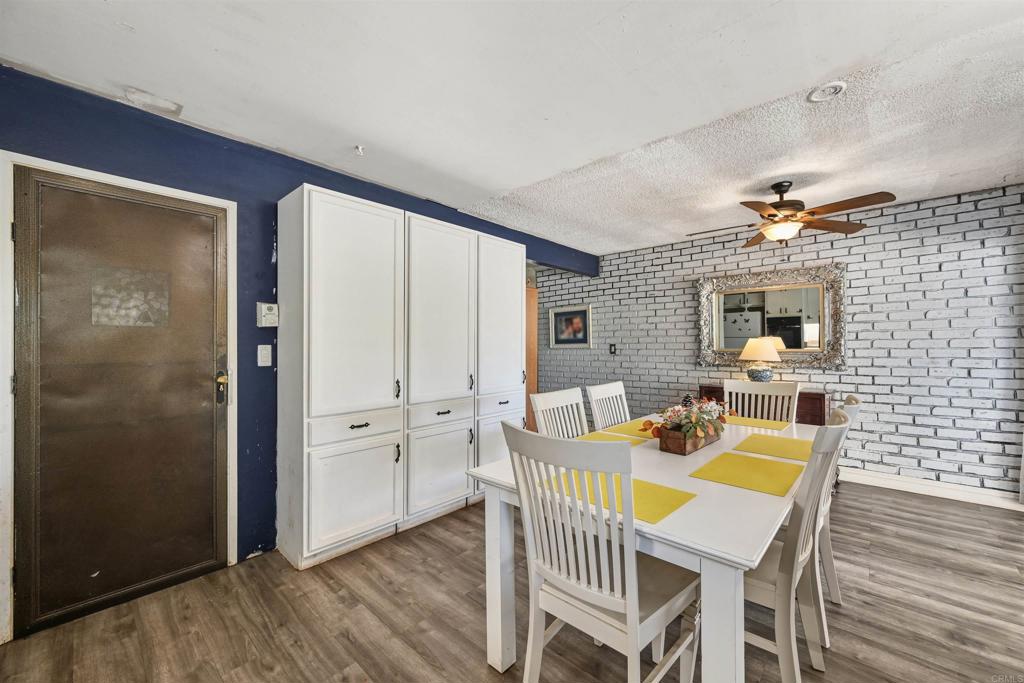 1480 Taylor Avenue Escondido, CA 92027 - Photo 8 of 23 a view of a dining room with furniture window and wooden floor