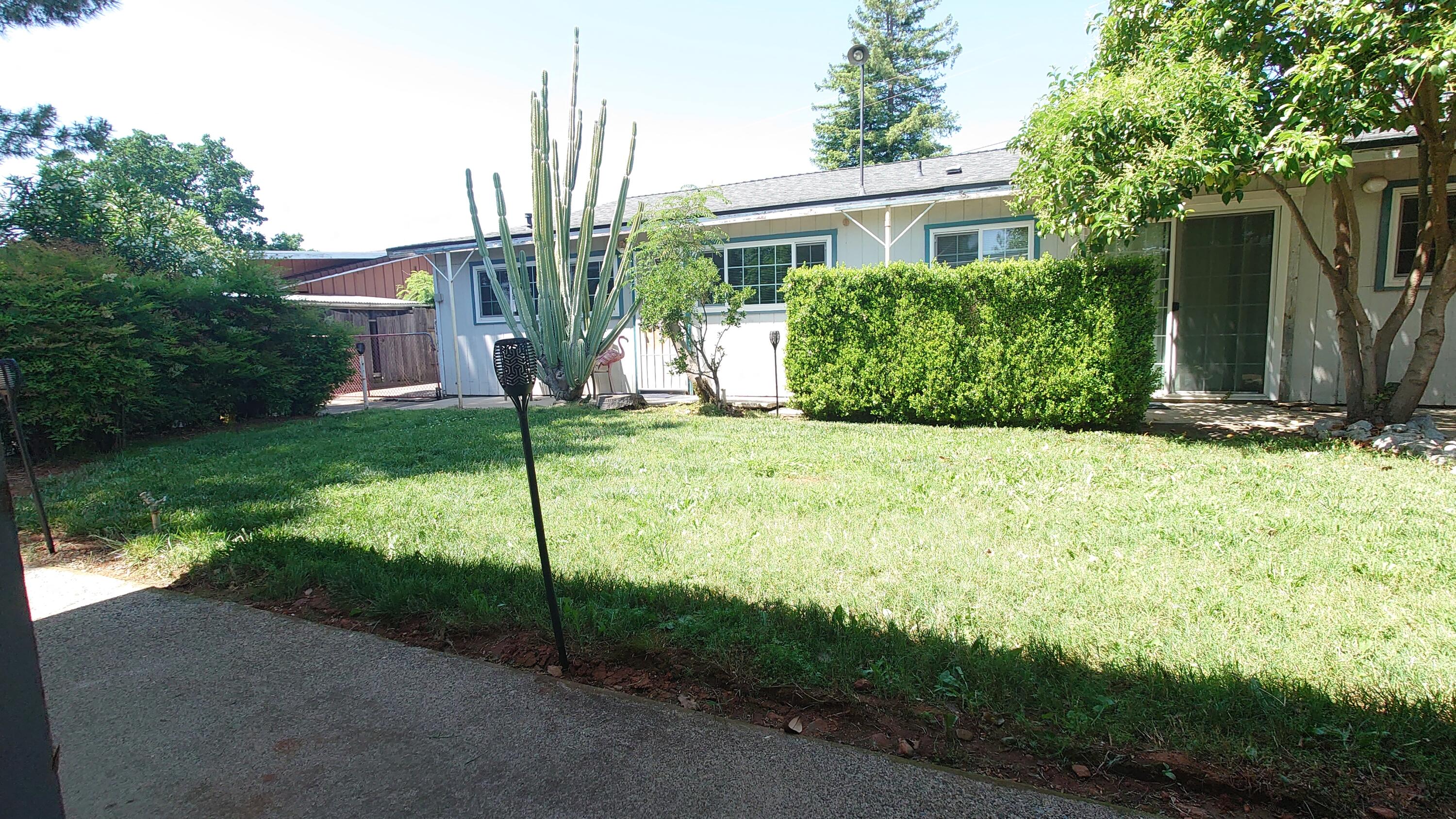 1713 Cascade Lane Redding, CA 96002 - Photo 11 of 12 a view of a back yard of the house