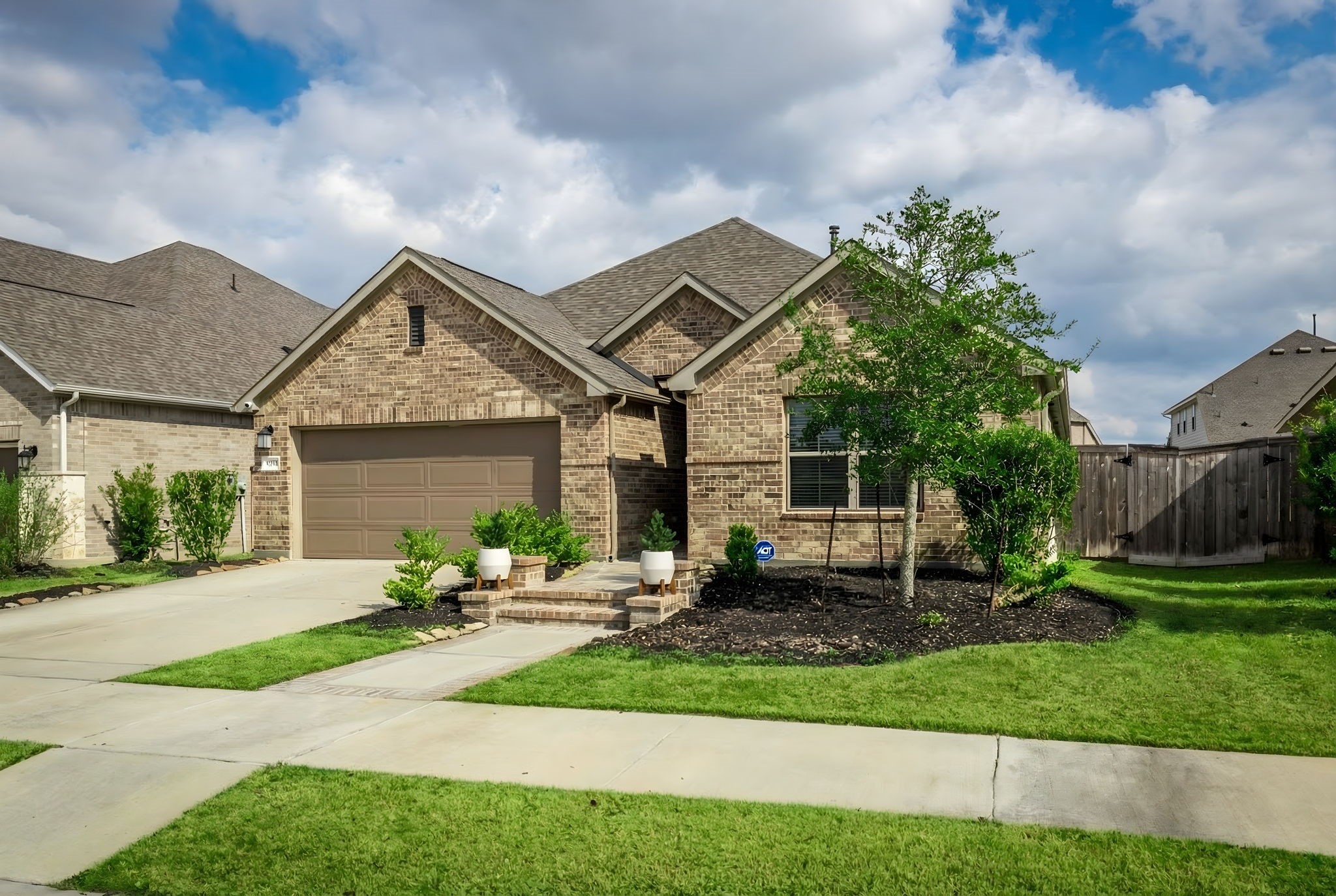 14914 Big Bend Ranch Drive Cypress, TX 77433 - Photo 1 of 49 a front view of a house with a yard and garage
