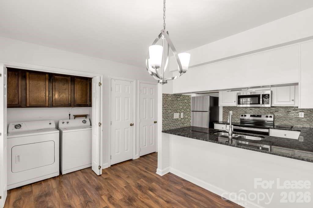 402 Sweetgum Drive Fort Mill, SC 29715 - Photo 3 of 10 a view of a kitchen with electric appliances and cabinets