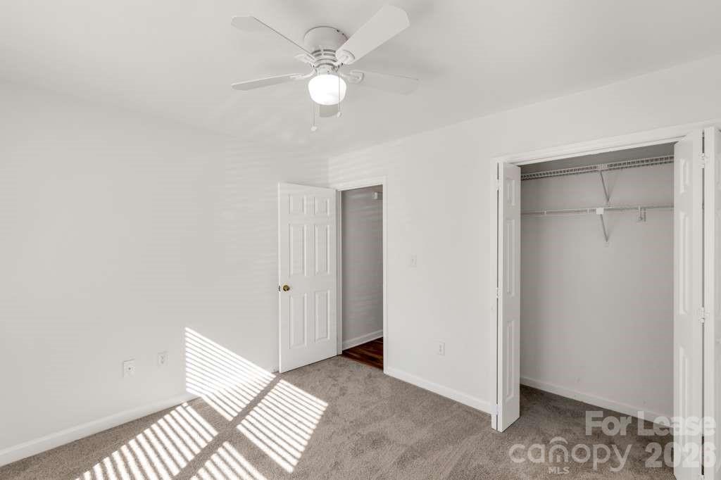 402 Sweetgum Drive Fort Mill, SC 29715 - Photo 8 of 10 a view of a room with wooden floor and fan