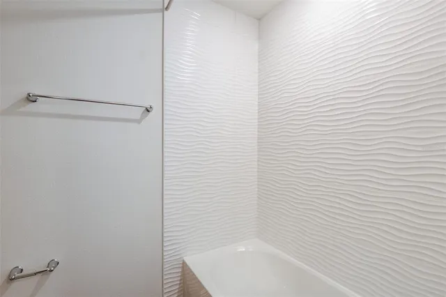 a bathroom with a bathtub