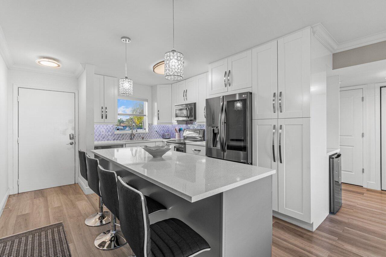 311 East Ocean Avenue, Unit 103 Lantana, FL 33462 - Photo 5 of 46 004-311EastOceanAvenue-Lantana-FL-33462-