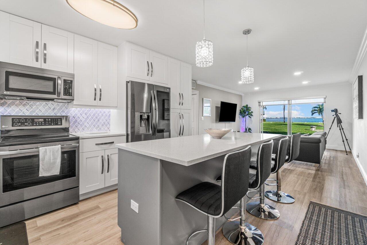 311 East Ocean Avenue, Unit 103 Lantana, FL 33462 - Photo 9 of 46 008-311EastOceanAvenue-Lantana-FL-33462-