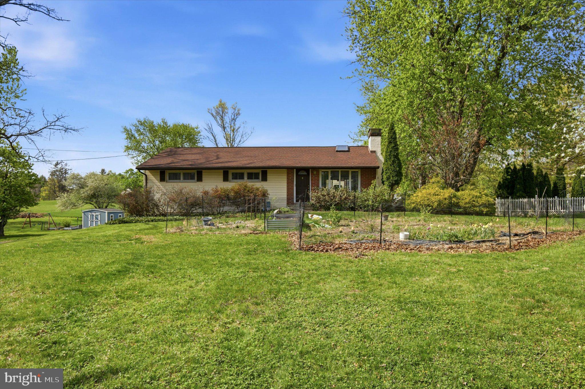 Charming home nestled in lush greenery.