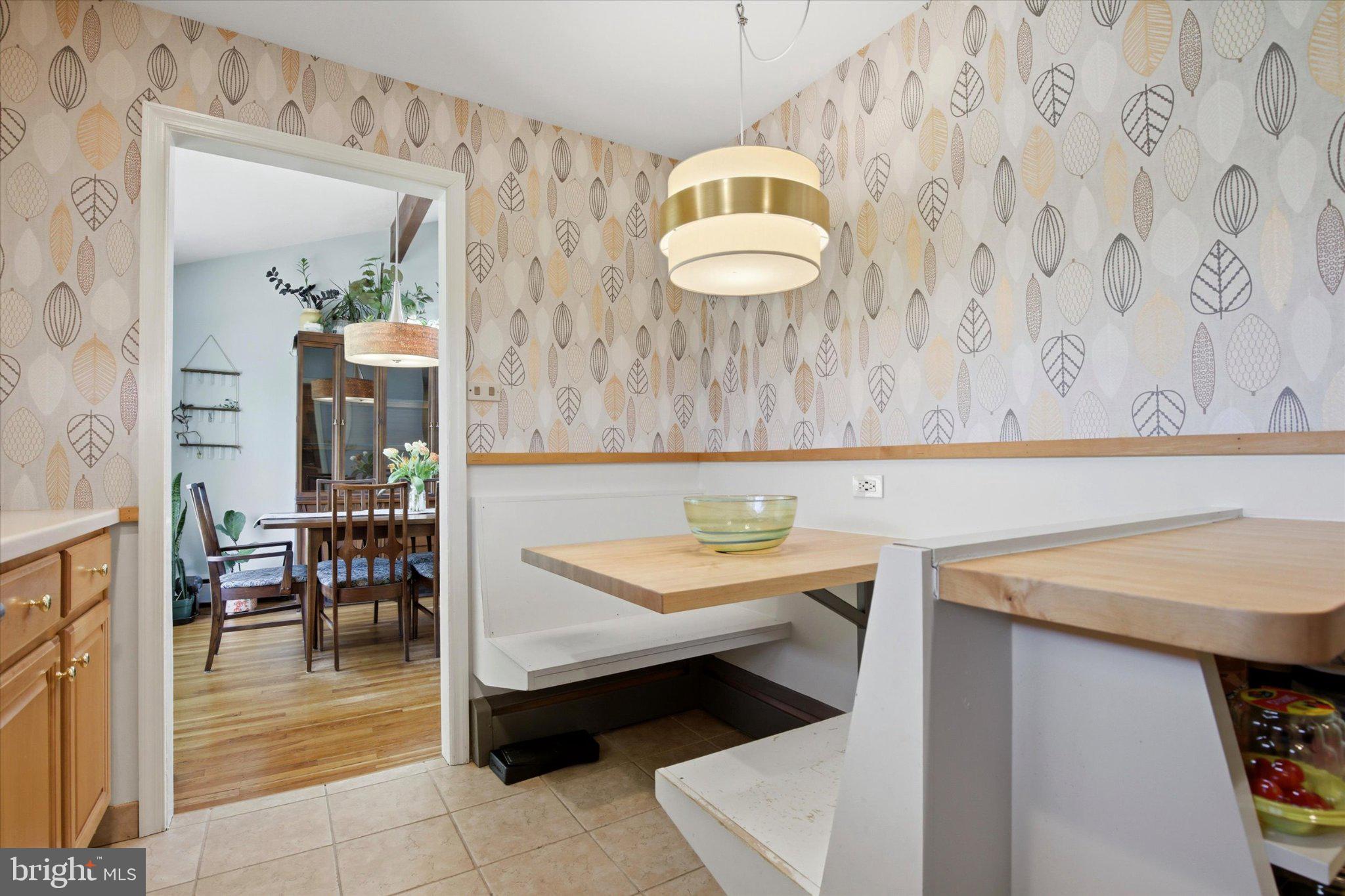 3386 Bristol Road Chalfont, PA 18914 - Photo 11 of 35 a bathroom with a sink a table and chairs