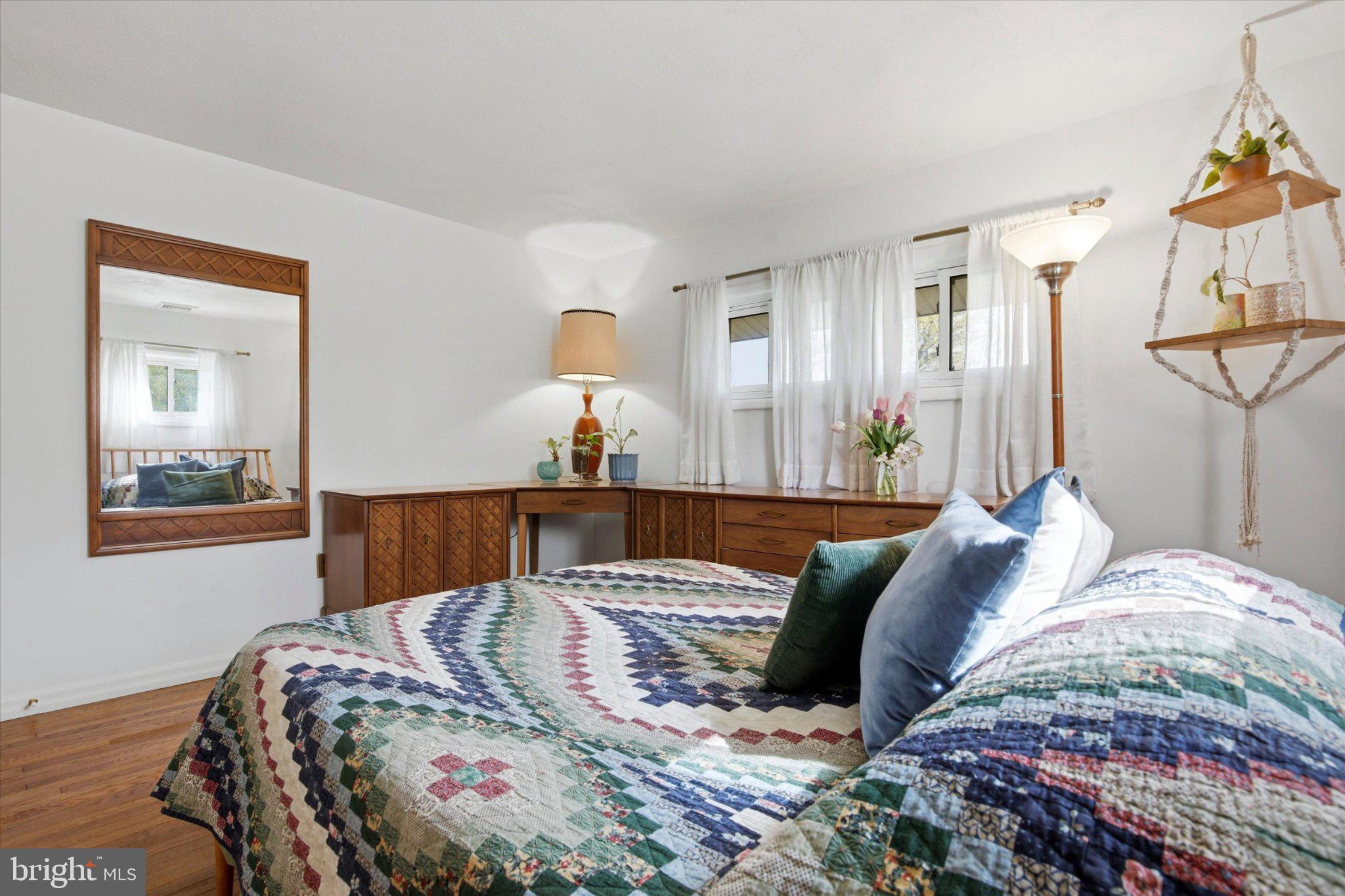 3386 Bristol Road Chalfont, PA 18914 - Photo 14 of 35 a bedroom with a bed and wooden floor