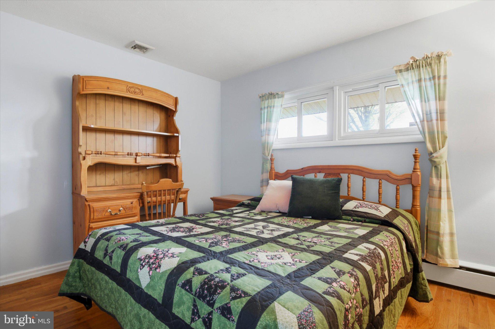 3386 Bristol Road Chalfont, PA 18914 - Photo 17 of 35 a bedroom with a bed and a window