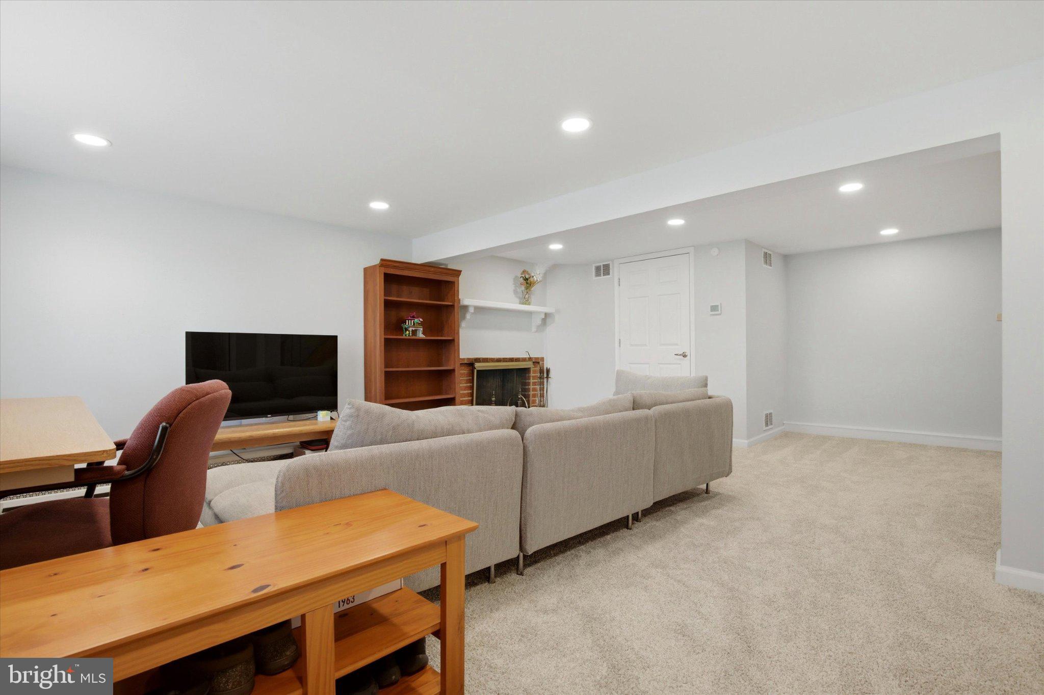 3386 Bristol Road Chalfont, PA 18914 - Photo 20 of 35 a living room with furniture and a flat screen tv