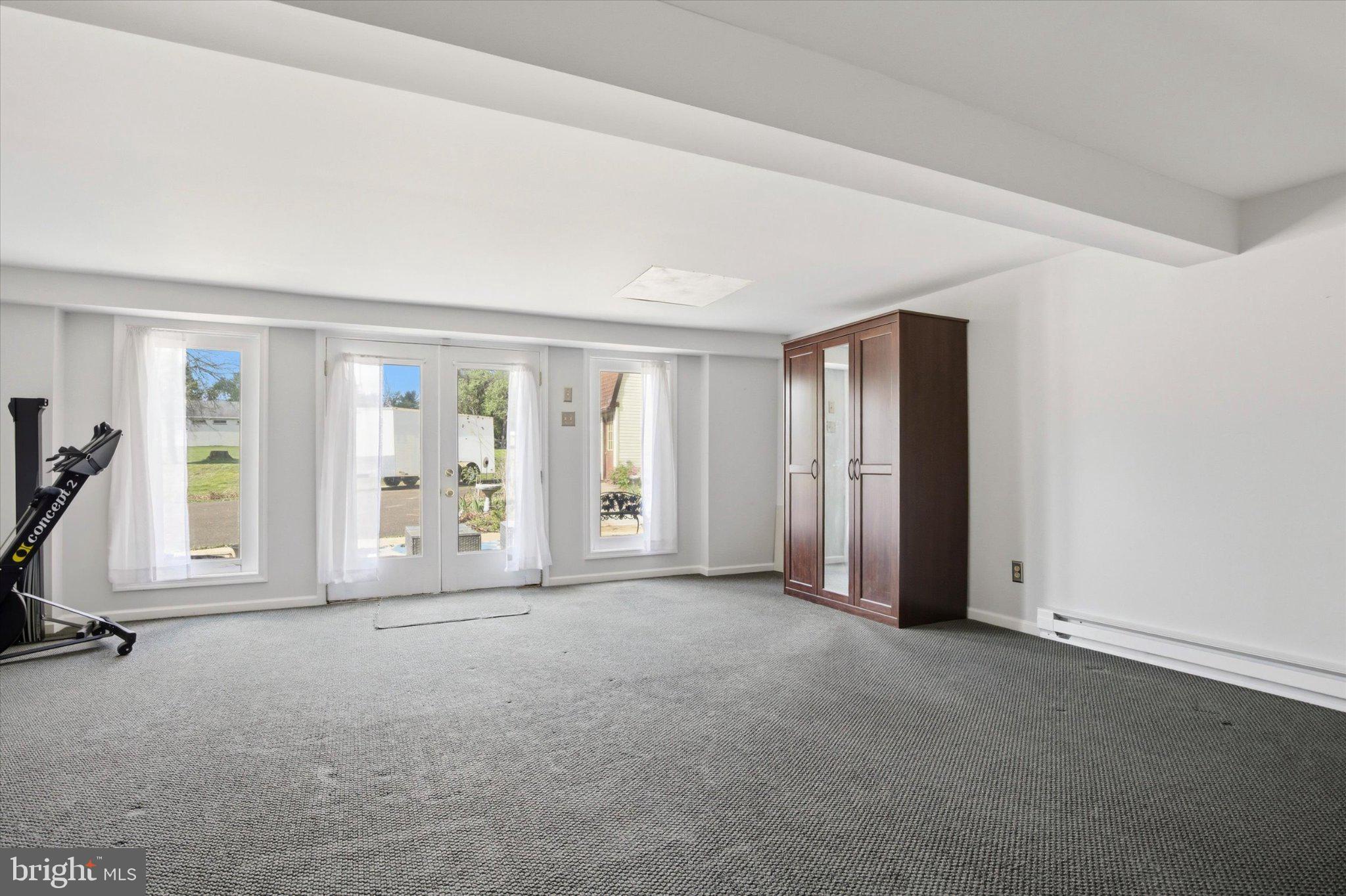 3386 Bristol Road Chalfont, PA 18914 - Photo 24 of 35 a view of an empty room with a window