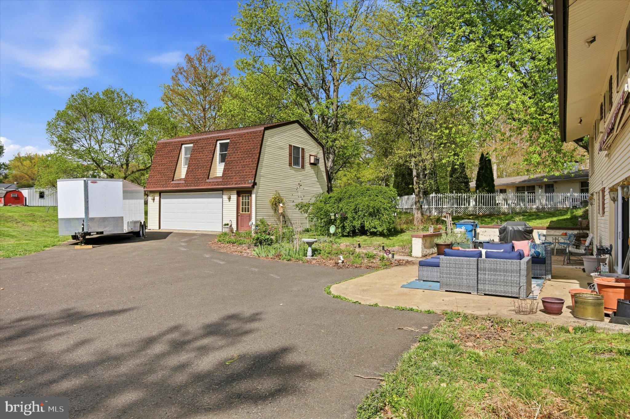 3386 Bristol Road Chalfont, PA 18914 - Photo 30 of 35 a view of backyard with outdoor seating and green space