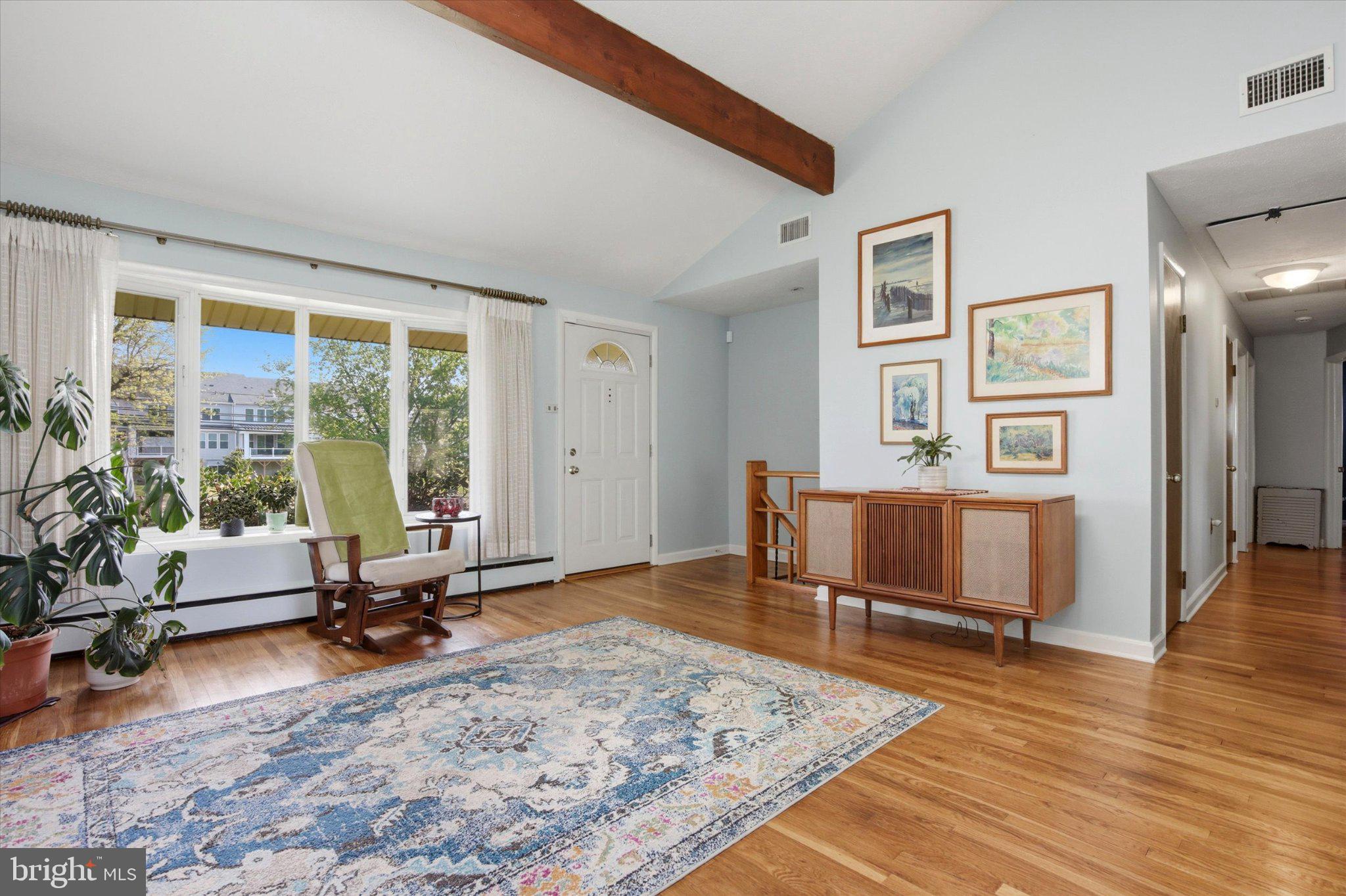 3386 Bristol Road Chalfont, PA 18914 - Photo 7 of 35 a living room with furniture rug and a large window