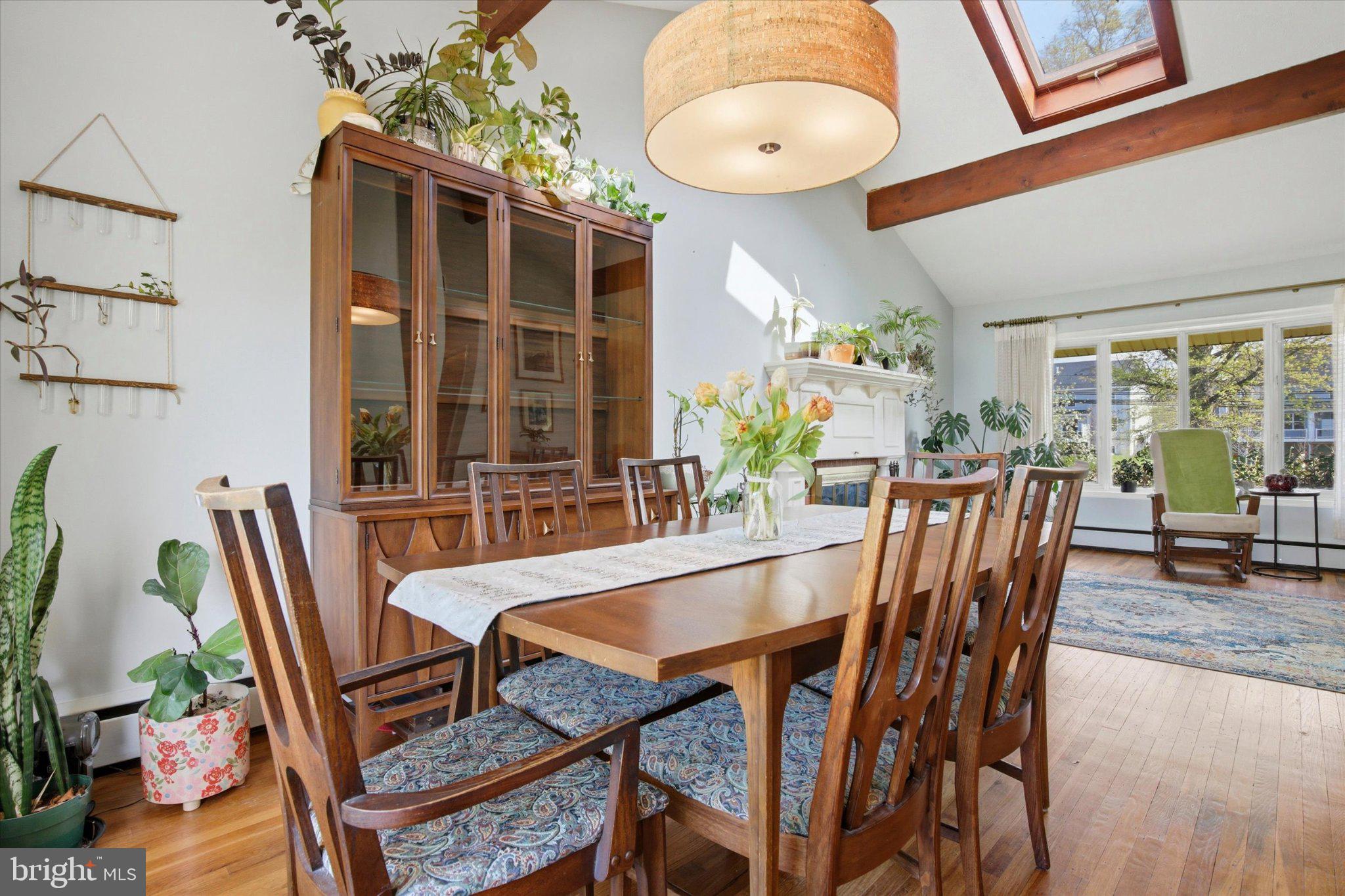 3386 Bristol Road Chalfont, PA 18914 - Photo 9 of 35 a dining room with furniture a potted plant and a large window