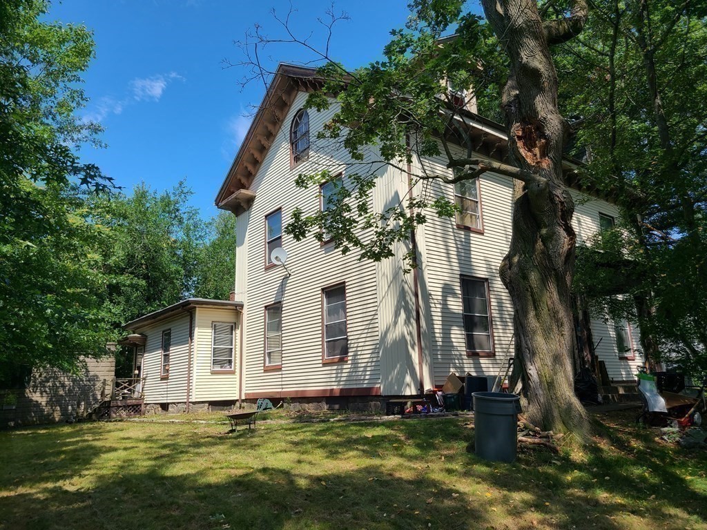 16 Malbert Road Boston, MA 02135 - Photo 1 of 38 a front view of a house with a yard