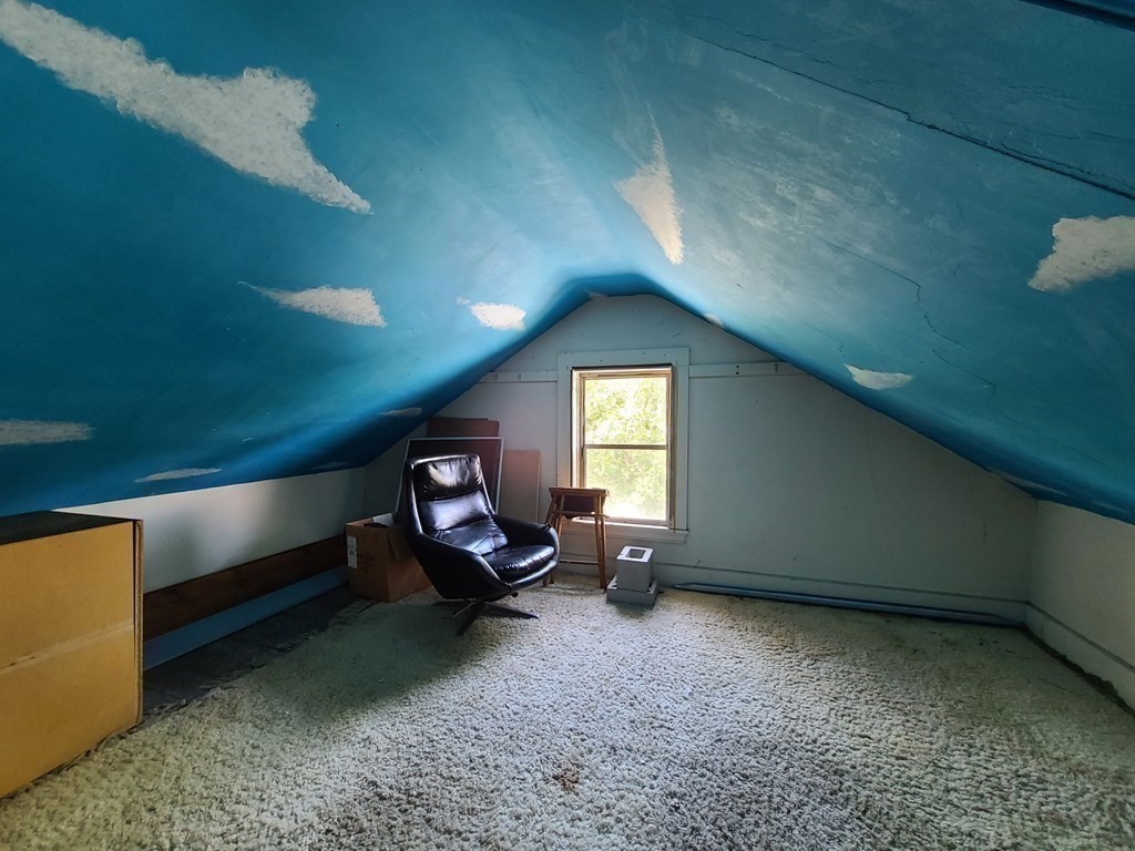 16 Malbert Road Boston, MA 02135 - Photo 26 of 38 a living room with furniture