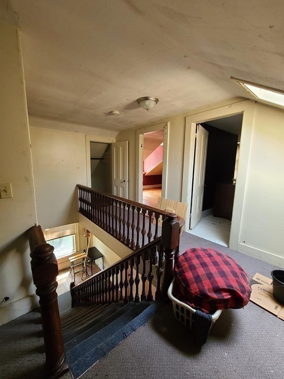 16 Malbert Road Boston, MA 02135 - Photo 28 of 38 a bedroom with furniture and a window