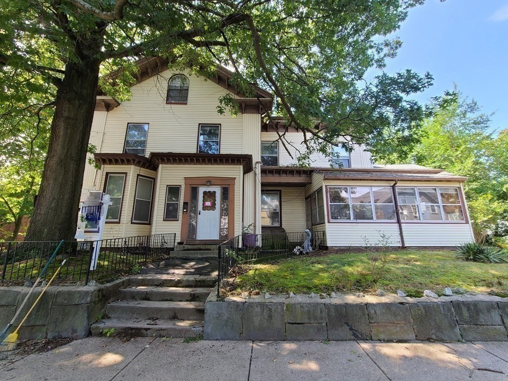 16 Malbert Road Boston, MA 02135 - Photo 29 of 38 a front view of a house with a yard