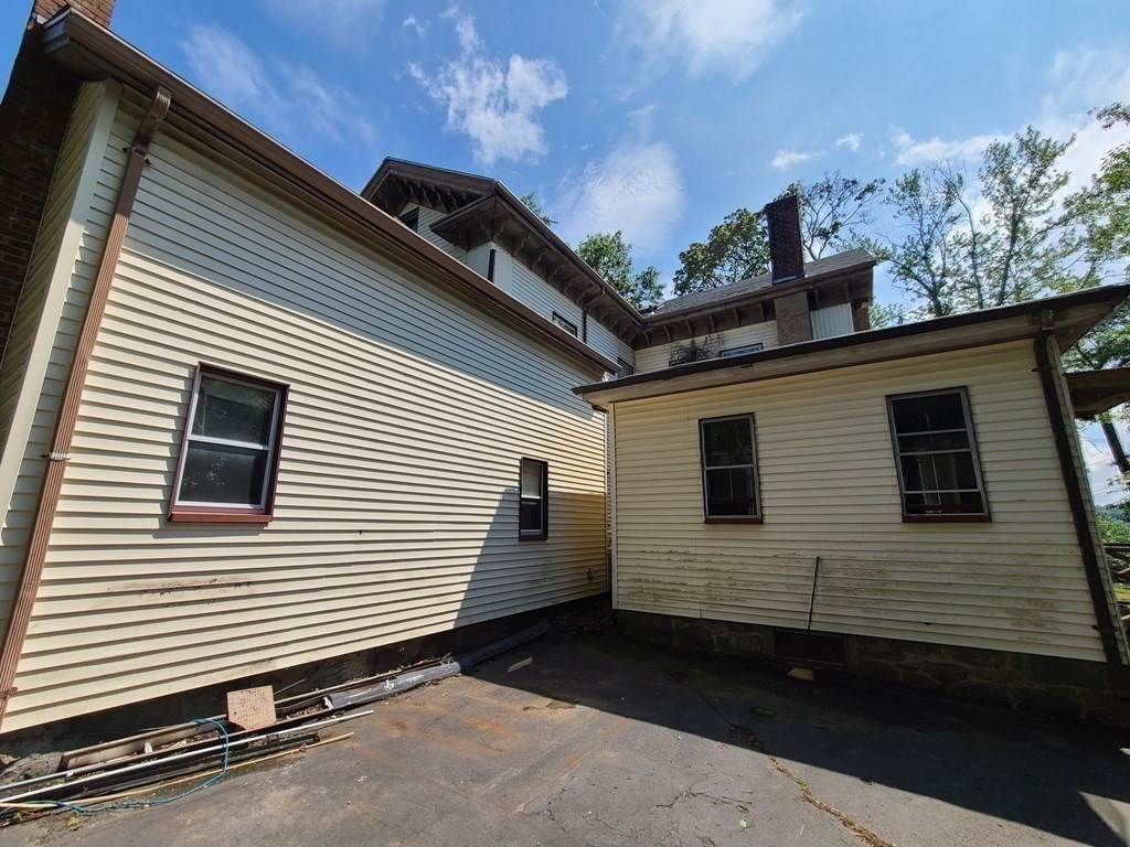 16 Malbert Road Boston, MA 02135 - Photo 31 of 38 a view of a back side of the house
