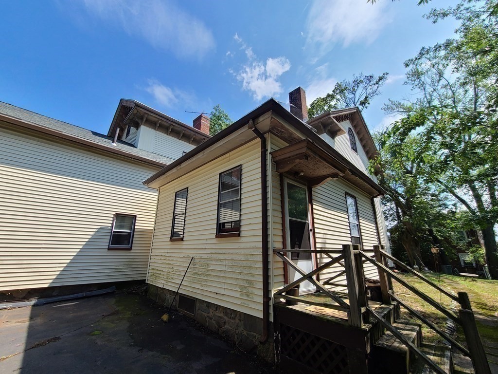 16 Malbert Road Boston, MA 02135 - Photo 32 of 38 a view of a house with a yard