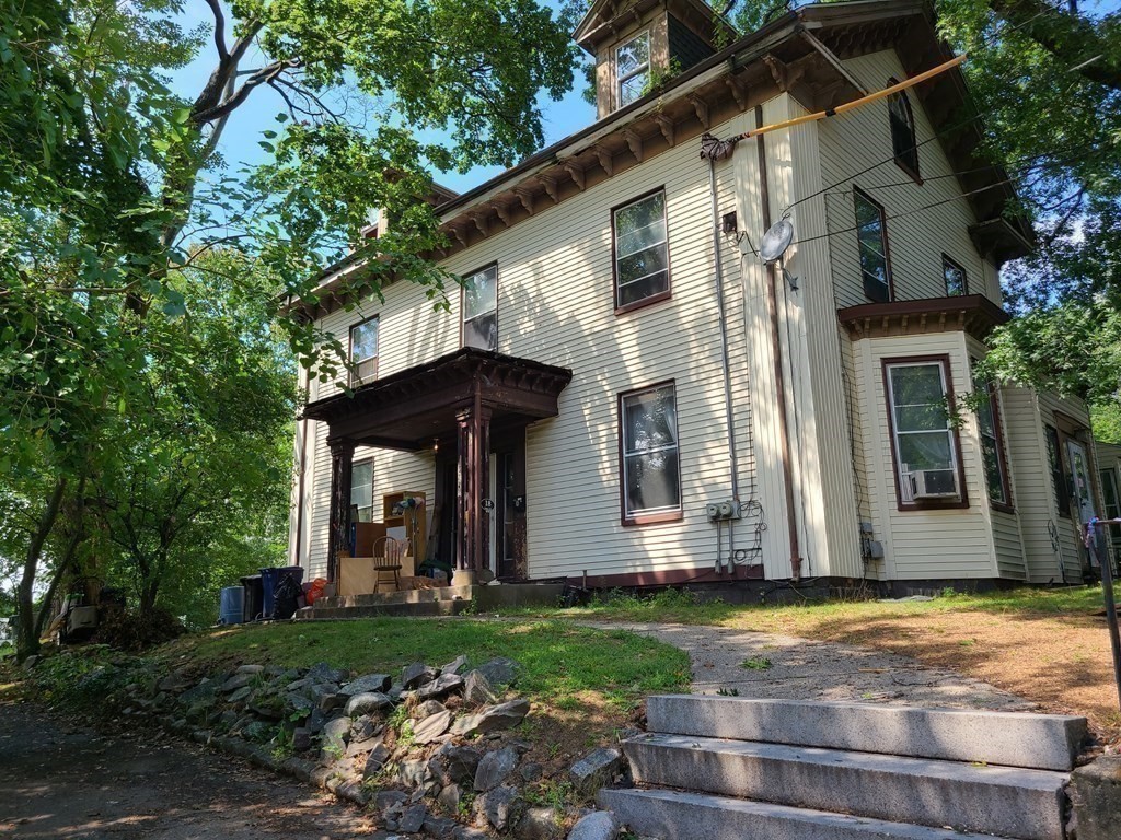 16 Malbert Road Boston, MA 02135 - Photo 36 of 38 a front view of house with yard