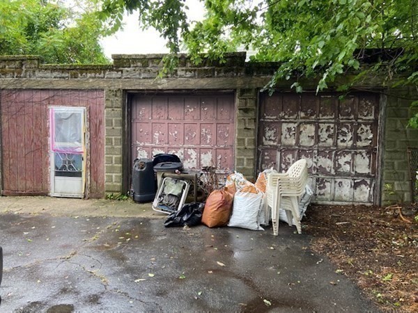 16 Malbert Road Boston, MA 02135 - Photo 37 of 38 a view of a chair and table in backyard of the house