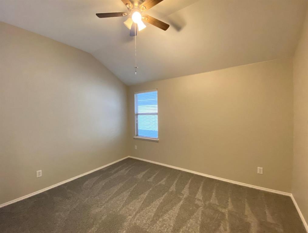 10608 Colfax Drive McKinney, TX 75072 - Photo 14 of 21 an empty room with a window and a fan