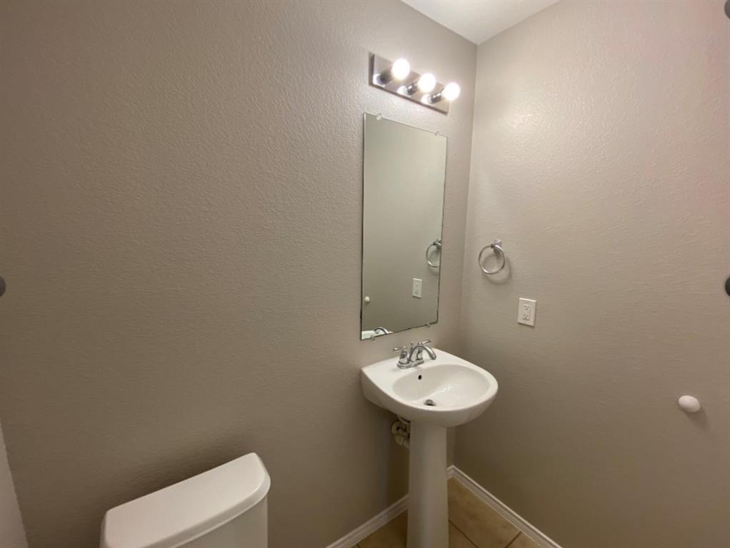 10608 Colfax Drive McKinney, TX 75072 - Photo 15 of 21 a bathroom with a sink toilet