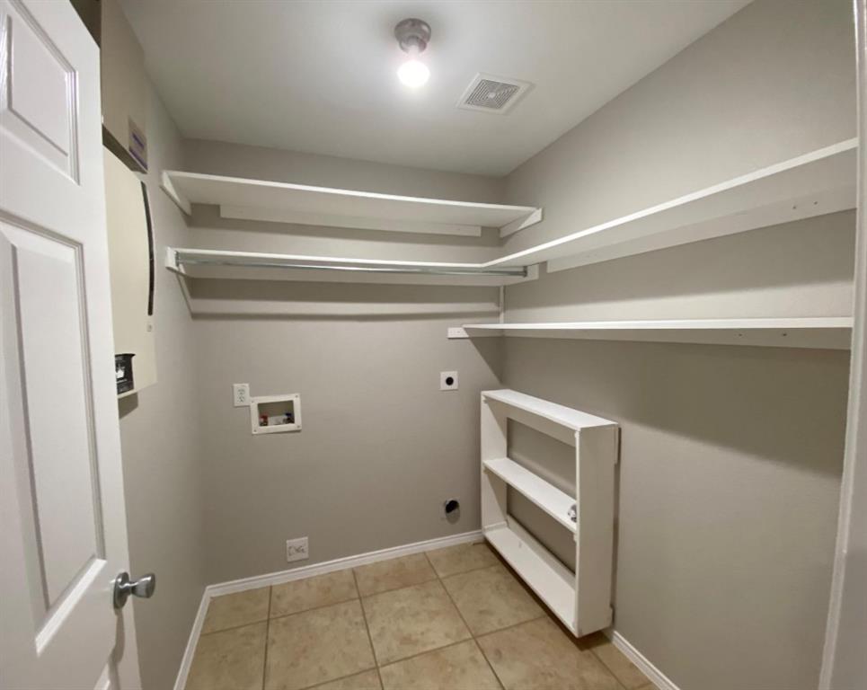 10608 Colfax Drive McKinney, TX 75072 - Photo 16 of 21 a view of an empty walk in closet