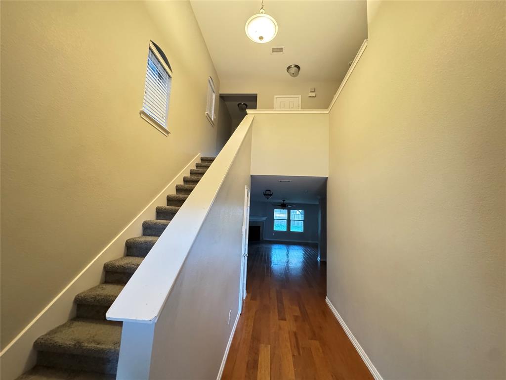 10608 Colfax Drive McKinney, TX 75072 - Photo 2 of 21 a view of entryway and hall with wooden floor